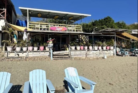 Beachfront cocktails and sunset views at Lainup Bar on Playa Remanso, San Juan del Sur, Nicaragua