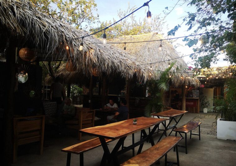 Lively open-air dining space at Gastro Garden with global food stalls in San Juan del Sur, Nicaragua