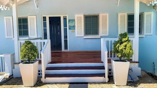 Exterior view of Victorian-style beach house with private pool and ocean views in La Talanguera, San Juan del Sur