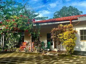 Chez Nous B&B's lush garden terrace overlooking the hills of San Juan del Sur, Nicaragua