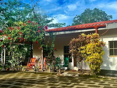 Chez Nous B&B's lush garden terrace overlooking the hills of San Juan del Sur, Nicaragua