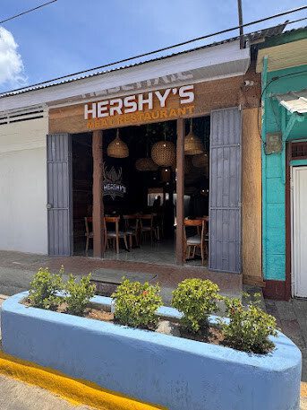 Outside view of Hersheys Meat Restaurant in San Juan del Sur – Elegant dining area with premium steak dishes"