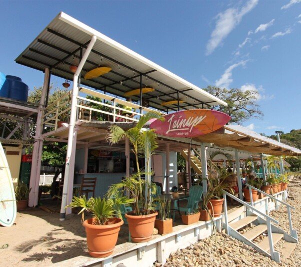 Rooftop dining area at Lainup Kitchen with ocean views in San Juan del Sur, Nicaragua