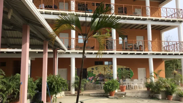Black Pearl Inn's outdoor pool area with ocean view in San Juan del Sur, Nicaragua