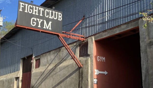 Fight Club Gym San Juan del Sur – Interior view featuring boxing ring and fitness equipment