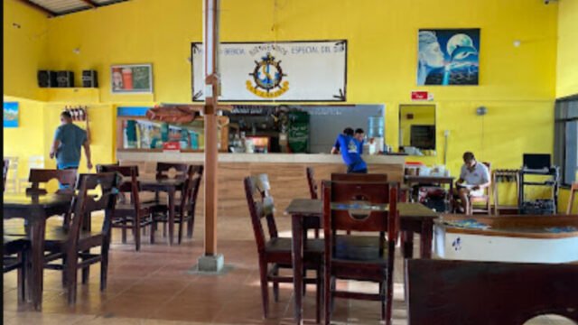 La Lancha restaurant exterior with lakeside view and outdoor seating in San Juan del Sur, Nicaragua