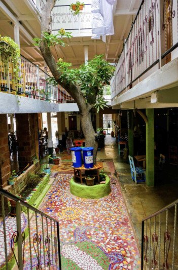 Casa Oro Eco Hostel in San Juan del Sur, featuring eco-friendly design, rooftop terrace, and proximity to the beach.