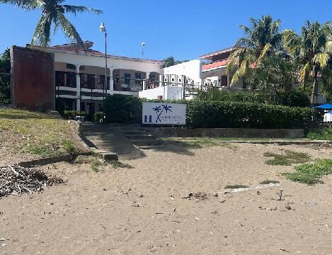 Exterior view of HC Liri Hotel with pool and beachfront in San Juan del Sur, Nicaragua