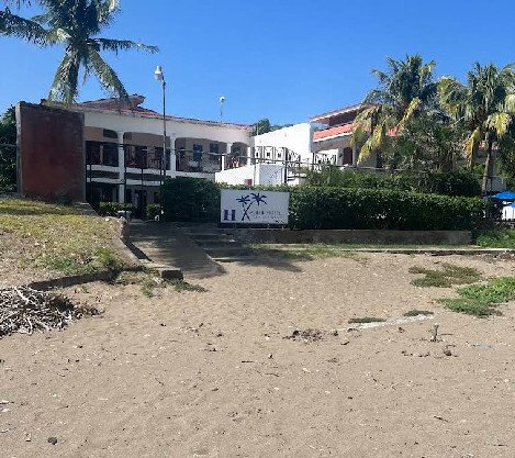 Exterior view of HC Liri Hotel with pool and beachfront in San Juan del Sur, Nicaragua
