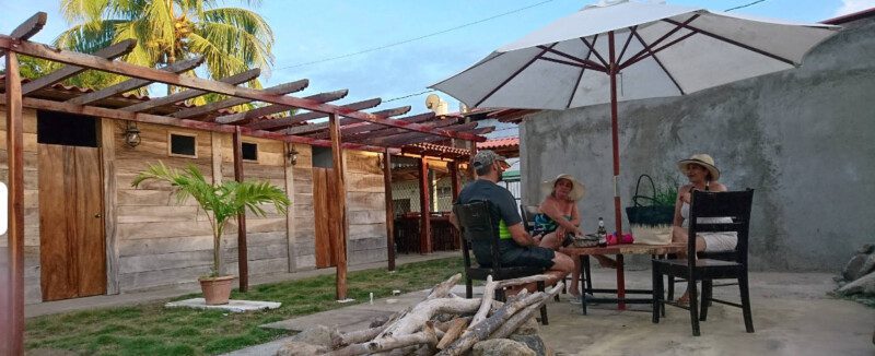 Bistro & Bar – Elegant interior with ambient lighting and guests enjoying cocktails in San Juan del Sur