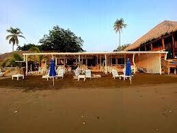 Interior of Restaurante El Velero showcasing vibrant decor and live music setup in Granada, Nicaragua