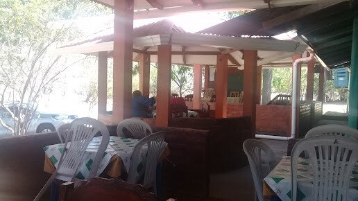 Interior of Bar y Restaurante El Naranjal showcasing traditional Nicaraguan decor and dining setup in La Guarida, Nicaragua