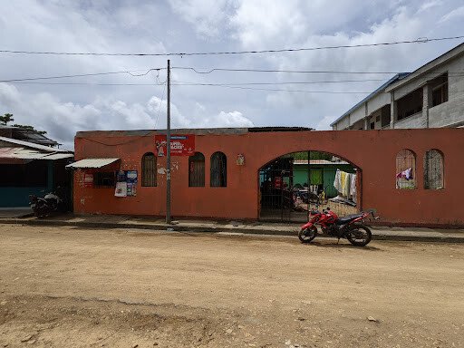 Outdoor terrace at Casa Mallela with diners enjoying traditional Nicaraguan dishes and sunset views in San Juan del Sur