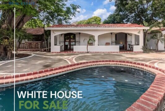 A pool view of a property featured by Horizonte Nica Real Estate in San Juan del Sur