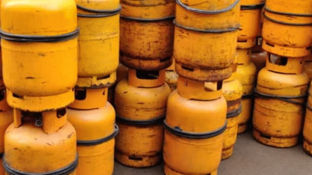 Propane gas store with rows of yellow gas tanks in Rivas, Nicaragua