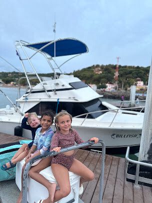 28-foot Bertram sportfishing boat cruising off San Juan del Sur