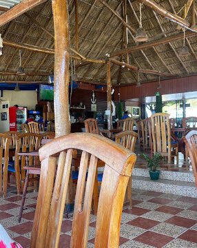 Beachfront classroom at Lago Azul Spanish School with students and teacher overlooking the bay in San Juan del Sur